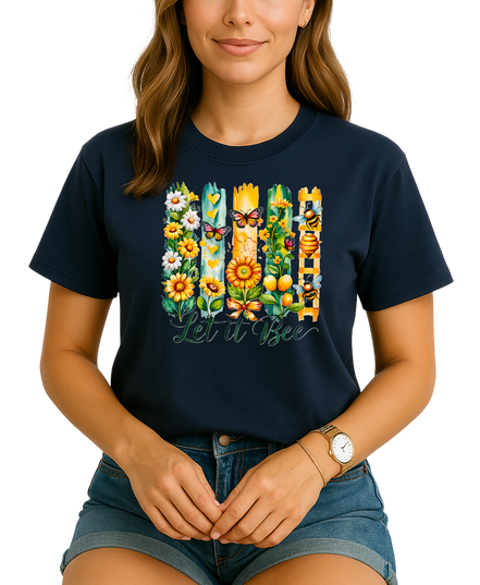 Woman wearing a navy blue t-shirt with floral and bee design