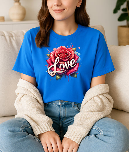 Woman wearing Blue Love Rose graphic T-shirt with red rose and splash design, handmade organic cotton romantic and trendy fashion tee