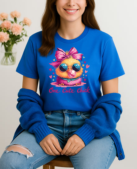 Woman wearing blue One Cute Chick graphic T-shirt with a chick in sunglasses blowing bubblegum, handmade organic cotton fun fashion tee