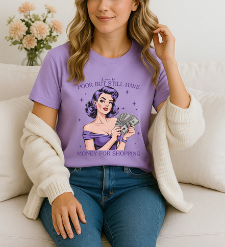 Woman wearing Purple retro pin-up graphic T-shirt with I Can Be Poor But Still Have Money for Shopping text, handmade organic cotton fashion tee
