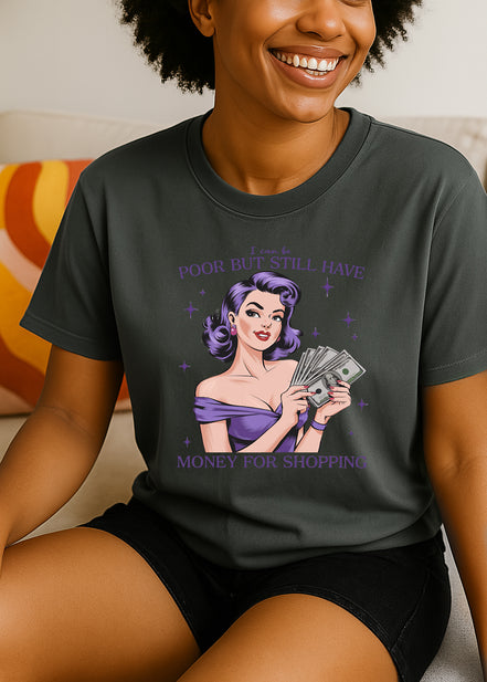 Woman wearing gray retro pin-up graphic T-shirt with I Can Be Poor But Still Have Money for Shopping text, handmade organic cotton fashion tee