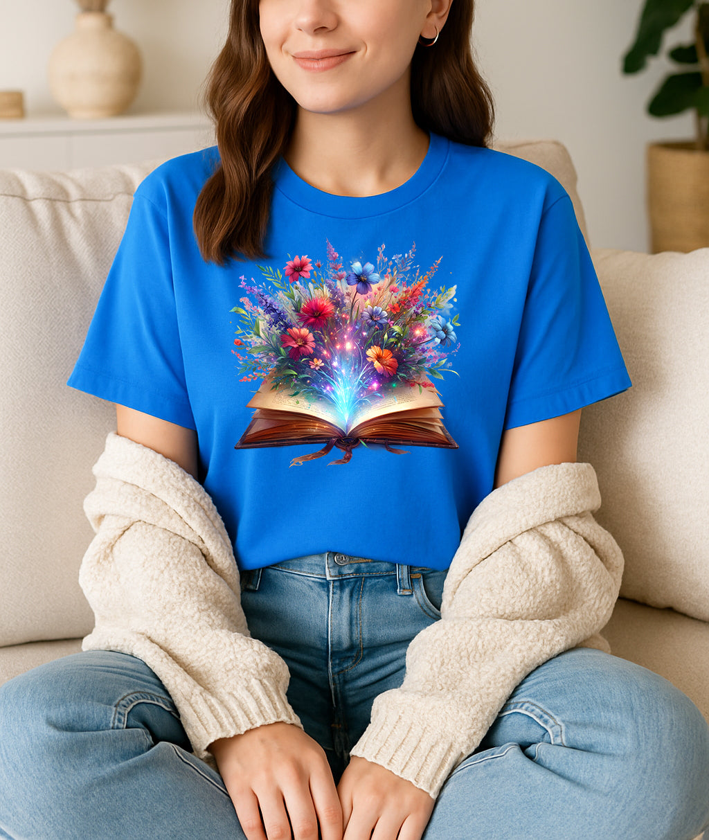 Woman wearing Blue floral book graphic T-shirt, handmade organic cotton literary fashion tee, nature-inspired design for book lovers