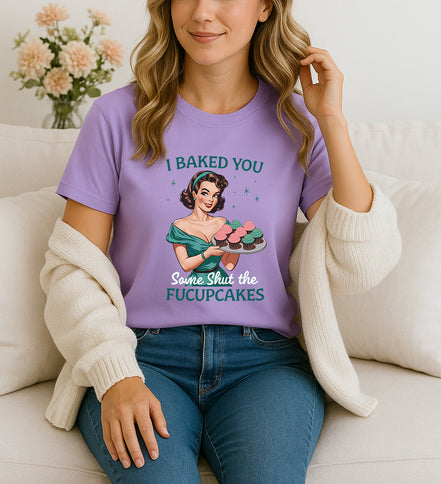 Woman wearing purple I Baked You Some Shut the Fucupcakes retro pin-up graphic T-shirt, handmade organic cotton witty statement fashion tee.