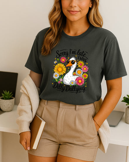 Woman wearing gray Sorry I’m Late I Was Dilly Dallying graphic T-shirt with duck and flowers, handmade organic cotton fun and casual fashion tee