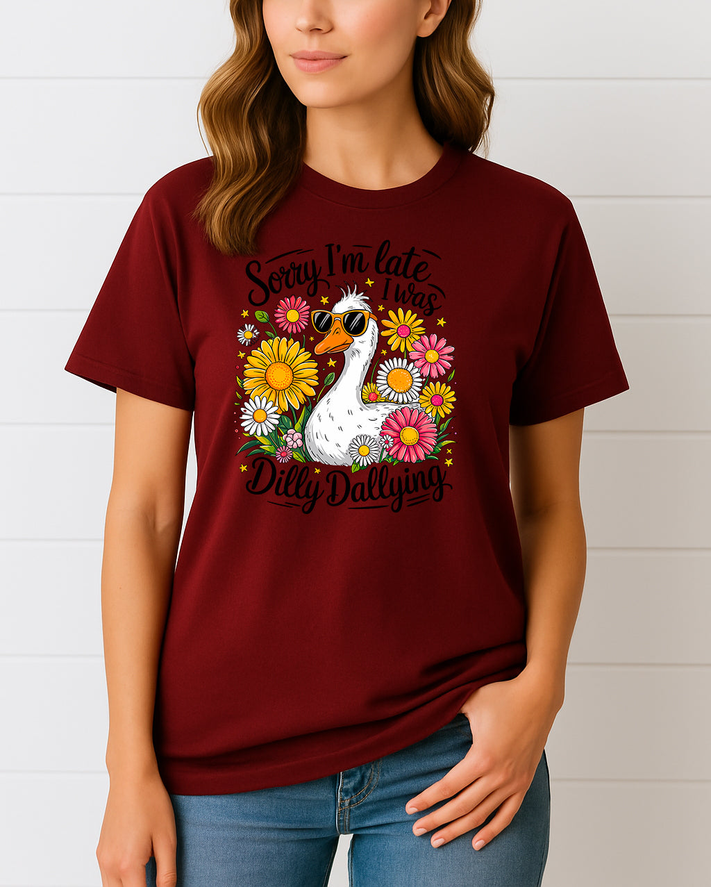 Woman wearing Maroon Sorry I’m Late I Was Dilly Dallying graphic T-shirt with duck and flowers, handmade organic cotton fun and casual fashion tee