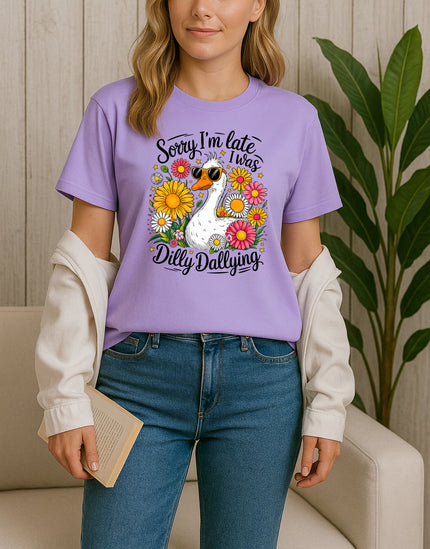 Woman wearing Purple Sorry I’m Late I Was Dilly Dallying graphic T-shirt with duck and flowers, handmade organic cotton fun and casual fashion tee