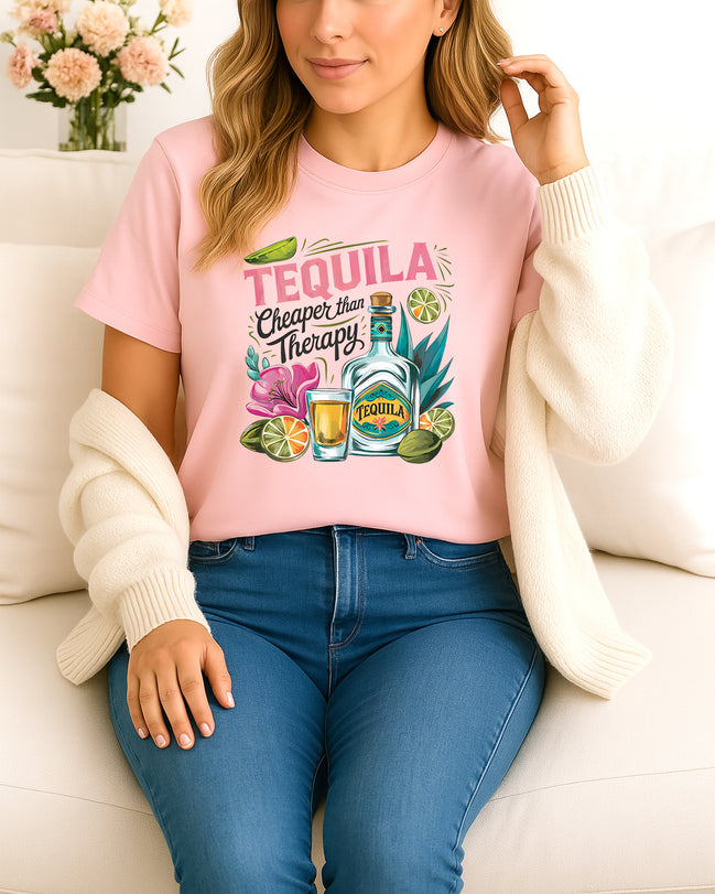 Woman wearing Pink Tequila Cheaper Than Therapy graphic T-shirt with tequila bottle and lime design, handmade organic cotton fun fashion tee