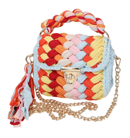 Colorful woven handbag with braided handle and gold chain strap on a white background