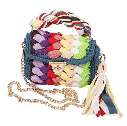 Colorful woven handbag with braided handle and tassel on a white background