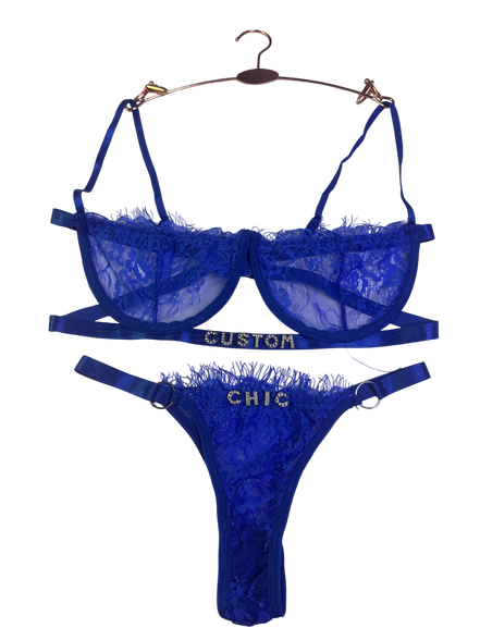 Blue lace lingerie set with 'Custom Chic' branding on a white background