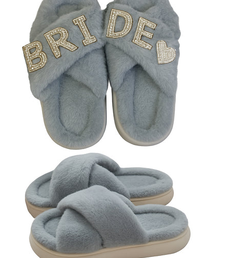 Pair of blue slippers with 'BRIDE' text on a white background