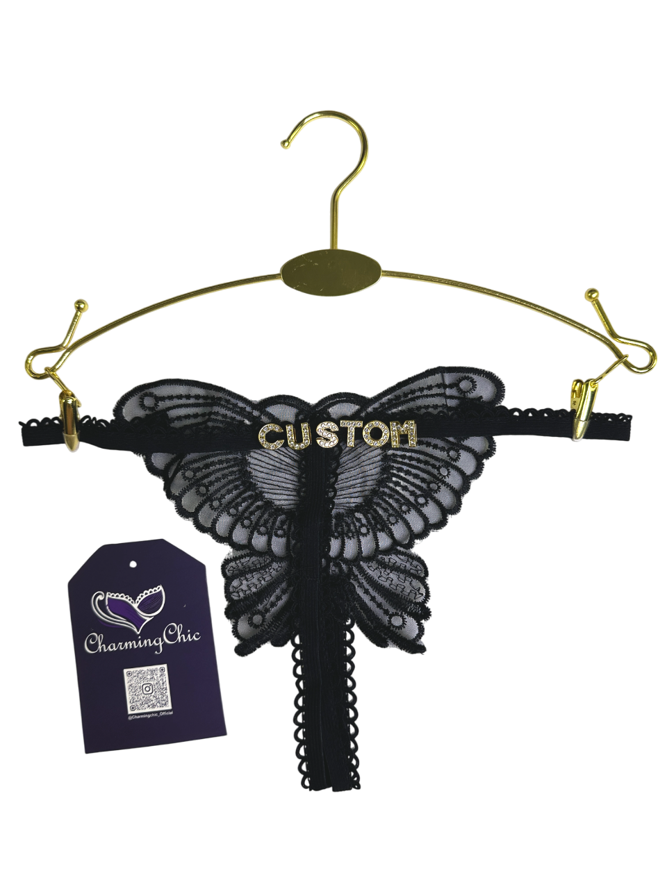 Black butterfly-shaped lace lingerie on a gold hanger with 'Custom' text, CharmingChic tag visible.