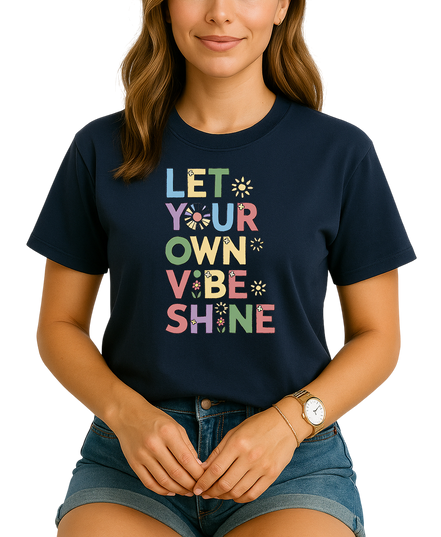 Person wearing a navy blue t-shirt with colorful text design on a white background