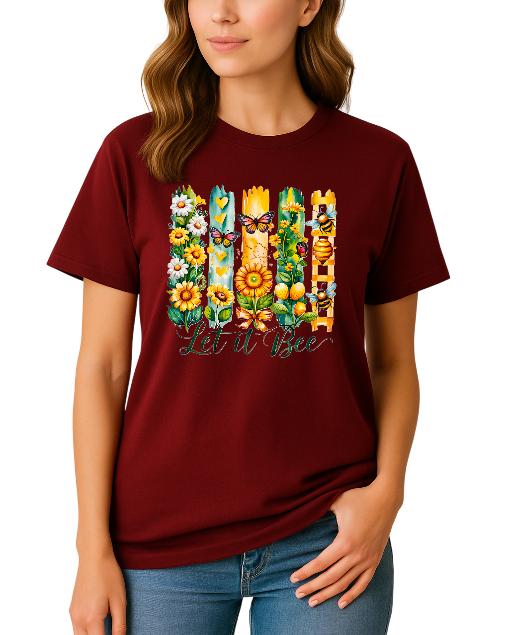 Woman wearing a maroon t-shirt with floral and bee design and text 'Let it Bee'.