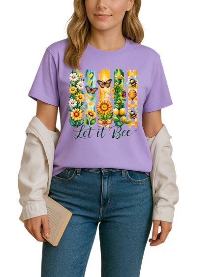 Person wearing a purple t-shirt with floral and bee design